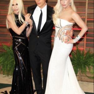 Donatella Versace Nolan Funk and Lady Gaga attend event Vanity Fair Oscar Party