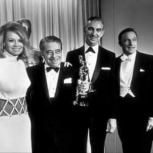 Gene Kelly, Alfred Newman, Angie Dickinson, Ken Darby