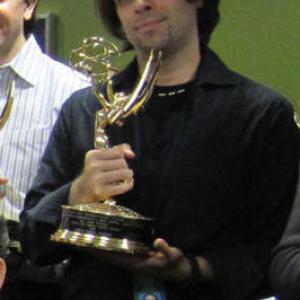 David receiving an Editing Emmy Award for Inside the Obama White House