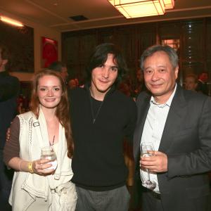 actors Janina Stopper and François Goeske with director Ang Lee at the premiere of 