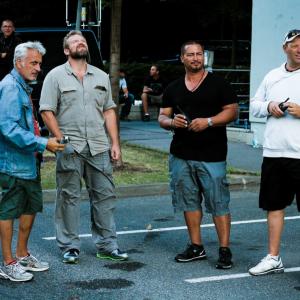 Director Joe Carnahan, Second Unit Director Ben Bray, DP Daniel Mindel and First A.D. James Bitonti think over a car chase sequence on location in Prague.