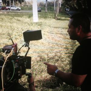 On location in Puerto Rico for the film In the Blood Director Ben Bray oversees second unit