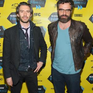 Jemaine Clement and Emanuel Michael at event of What We Do in the Shadows (2014)