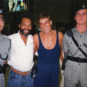 Jean Claude Van Damm and Haskell Vaughn Anderson III with 2 Hong Kong Police Officers after filming in Hong Kong of KICKBOXER