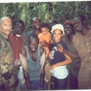 Awino Gam and Bruce Willis on set photo