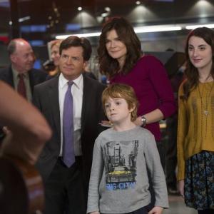 Still of Michael J. Fox, Betsy Brandt, Juliette Goglia and Jack Gore in The Michael J. Fox Show (2013)