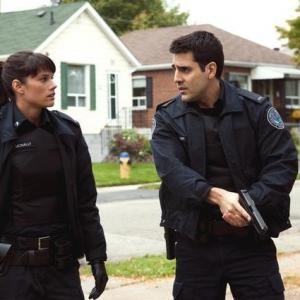 Still of Ben Bass and Missy Peregrym in Rookie Blue (2010)
