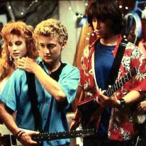 Bill & Ted's Excellent Adventure - WYLD STALLIONS band scene. In this photo, Kimberley Kates, Alex Winter, Keanu Reeves, Diane Franklin.