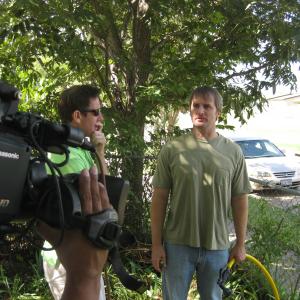 Director Jay Gormley with actor John Venable on the set of Basil