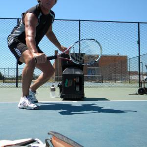 USPTA Tennis Pro/Instructor, working out