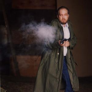 Rick Camp playing the shotgun killer Zack in the movie STRANGER IN TOWN