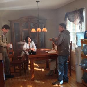 Jim Long directs Carl Bailey Lindsey McCollough and Victoria Fox on the set of THE PHONE IN THE ATTIC