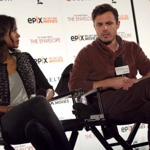 Casey Affleck and Zoe Saldana at event of Out of the Furnace (2013)