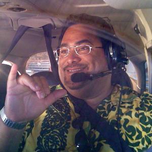 ʻKalaniʻ Flying his Cessna in ʻAloha Dazeʻ (2010)