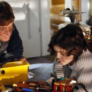 Still of Peter Krause and Max Burkholder in Parenthood 2010