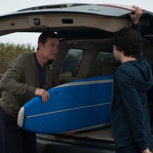 Still of Peter Krause and Max Burkholder in Parenthood (2010)