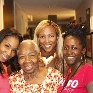 On set of Seasons of Love Princess Monique with writers Sharon Brathwaite-Sanders, Peres Owino & Mom