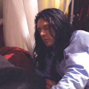 Still of Tommy Wiseau in The Room 2003