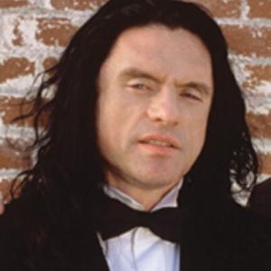 Still of Tommy Wiseau in The Room 2003