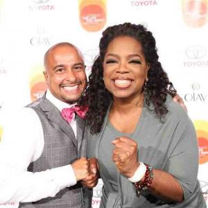 TVFilm choreographer Chuck Maldonado and Oprah Winfrey sharing a happy moment on the Red Carpet