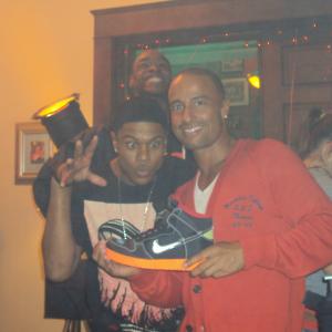 Chuck Maldonado showing off his new sponsor Nike to Actor Pooch Hall on the set of STY Homecoming