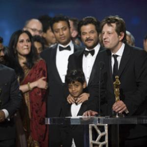 For Best motion picture of the year the Oscar goes to Slumdog Millionaire Fox Searchlight A Celador Films Production produced by Christian Colson Producer The 81st Academy Awards are presented live on the ABC Television network from The Kodak Theatre in Hollywood CA Sunday February 22 2009
