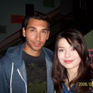 Gil Menchaca and Miranda Cosgrove on the set of ICARLY.
