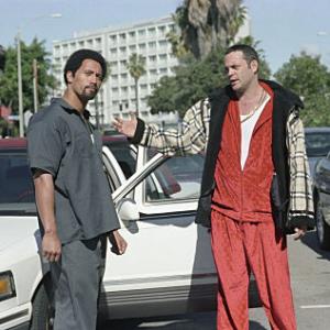 VINCE VAUGHN right as Raji and THE ROCK as Rajis bodyguard Elliot Wilhelm in MGM Pictures comedy BE COOL