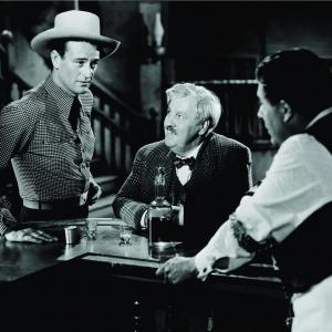 Still of John Wayne Cy Kendall and Robert McKenzie in Tall in the Saddle 1944