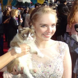 Darcy Rose Byrnes and Grumpy Cat on the Red Carpet at the World Premiere of Disneys CINDERELLA 2015 The El Capitan Theatre Hollywood CA
