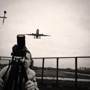 Shooting plates of passing airplanes.