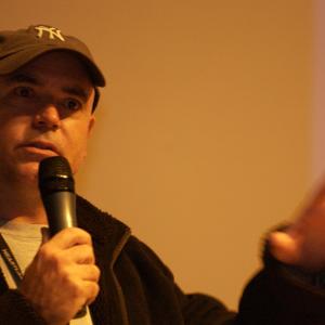 Schroeder answering questions at a Q & A after a MAN IN THE CHAIR screening.