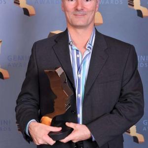 Serge Ct receiving his 2010 Gemini Award for his score for A World of Wonders