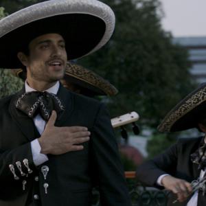 Still of Jaime Camil and Omar Chaparro in Pulling Strings (2013)