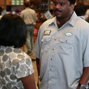 Still of Craig Robinson and Mindy Kaling in The Office 2005