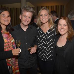 Laura Smith 2nd R and Rebecca Green R attend IMDbs 2014 Cannes Film Festival Dinner Party at Restaurant Mantel on May 19 2014 in Cannes France