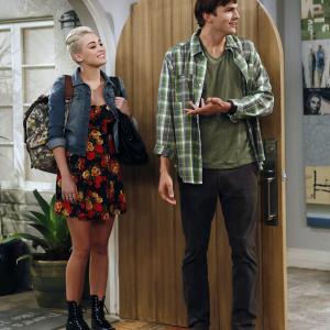 Still of Ashton Kutcher and Miley Cyrus in Two and a Half Men (2003)