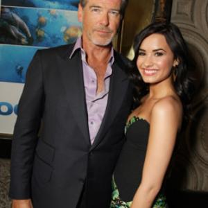 Pierce Brosnan and Demi Lovato at event of Oceacuteans 2009