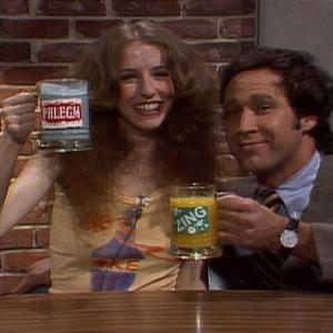 Still of Chevy Chase and Laraine Newman in Saturday Night Live 1975
