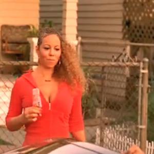 Still of Mariah Carey and Tysen Knight on the set of My Love music video.