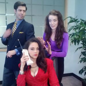 Paul Galliano, Tessa Munro (w/phone) and Laura Denton on the set of the comedy, 
