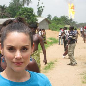 Feature film shoot on location in a village in the Niger Delta with real gas flares in the background. April 13, 2011