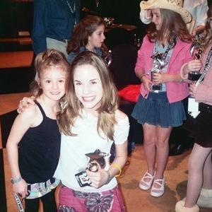 Lola poses with Christa B. Allen from 13 Going on 30 at the 2005 CARE Awards at Universal Studios.