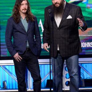 Toby Halbrooks (L) and James M. Johnston accept the Producers Award onstage during the 2014 Film Independent Spirit Awards at Santa Monica Beach on March 1, 2014 in Santa Monica, California.