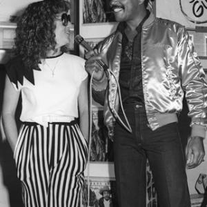 Teena Marie and Alonzo Miller of KACE radio station in Los Angeles at a Freeway Records store sales promotion