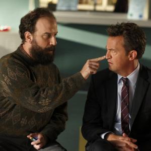Still of Matthew Perry and Brett Gelman in Go On: There's No 'Ryan' in Team (2012)