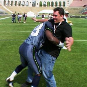 Los Angeles Memorial Coliseum getting tackled by a Seattle Seahawk for Upper Deck Football Cards