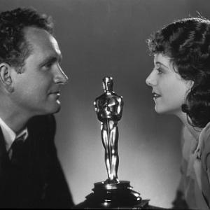 Janet Gaynor with her Best Actress Oscar and Director Frank Borzage