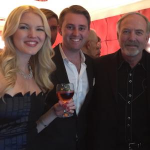 David Sheftell, Ashley Campbell, and Director James Keach at the premier of 