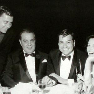 Photo taken in 1967 during the making of Chitty Chitty Bang Bang (1968). (left to right) Robert B. Sherman, Albert R. Broccoli, Richard M. Sherman, Dana Broccoli.